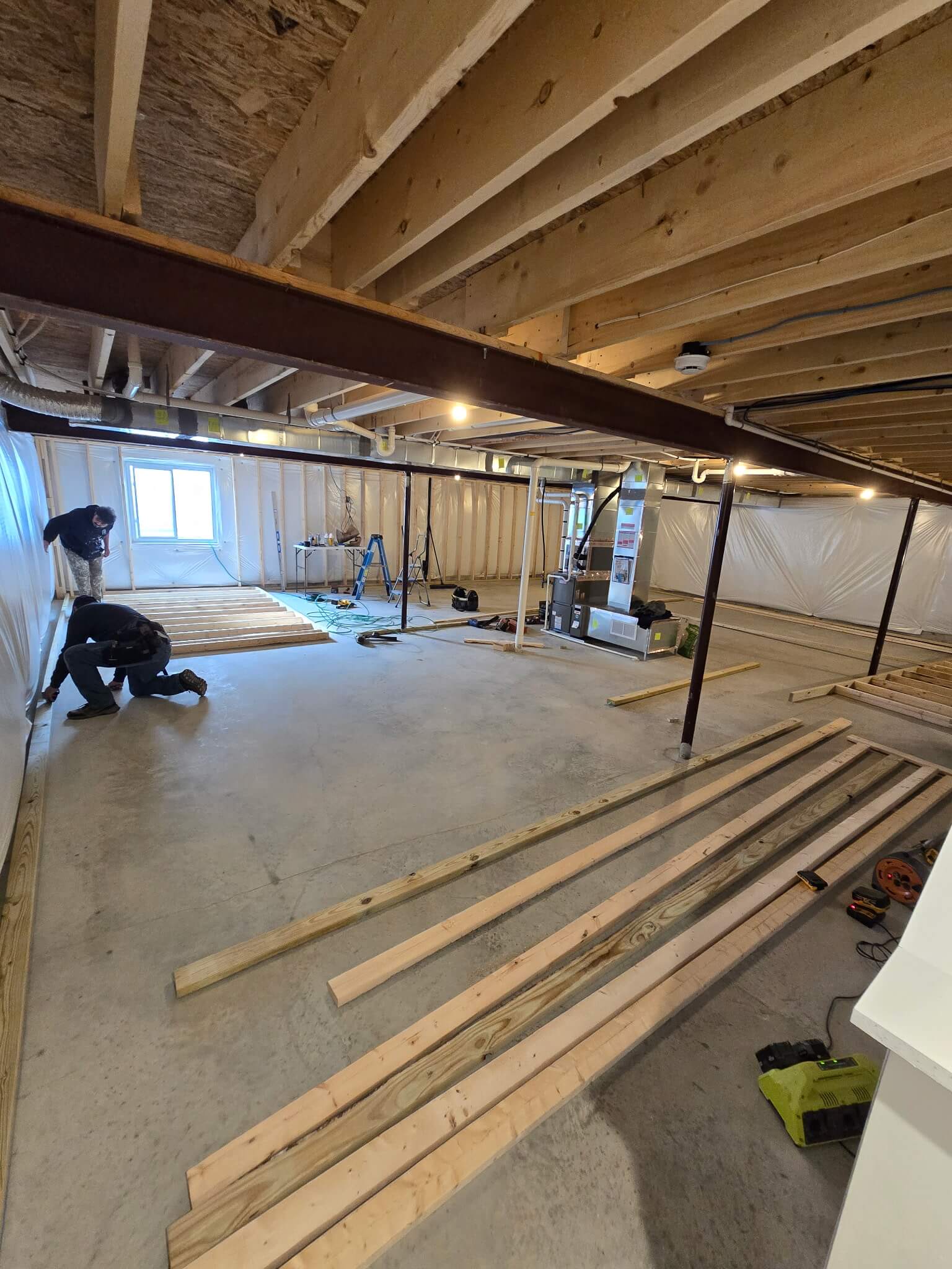 Before: Unfinished basement space